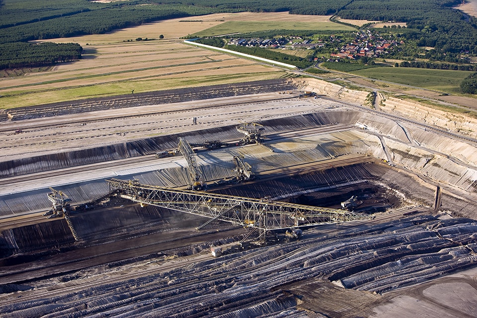 Lausitz Coal Mines, Lignite mine with town of Greissen in background